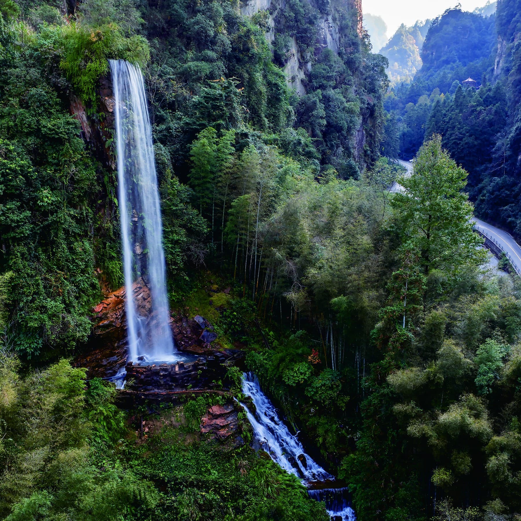 Baofeng Waterfall descending beside the scenic approach